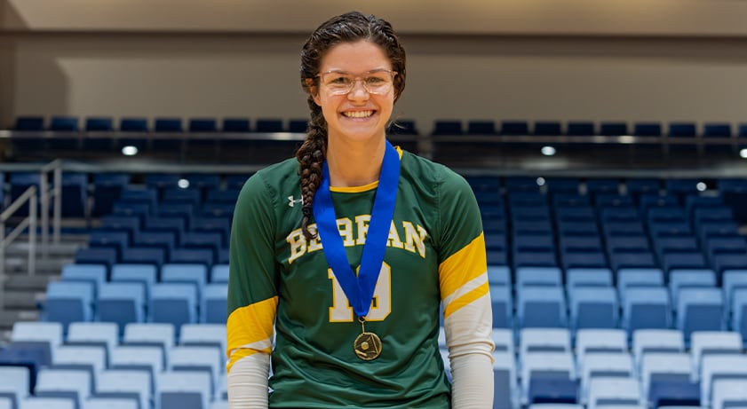 Volleyball player with medal